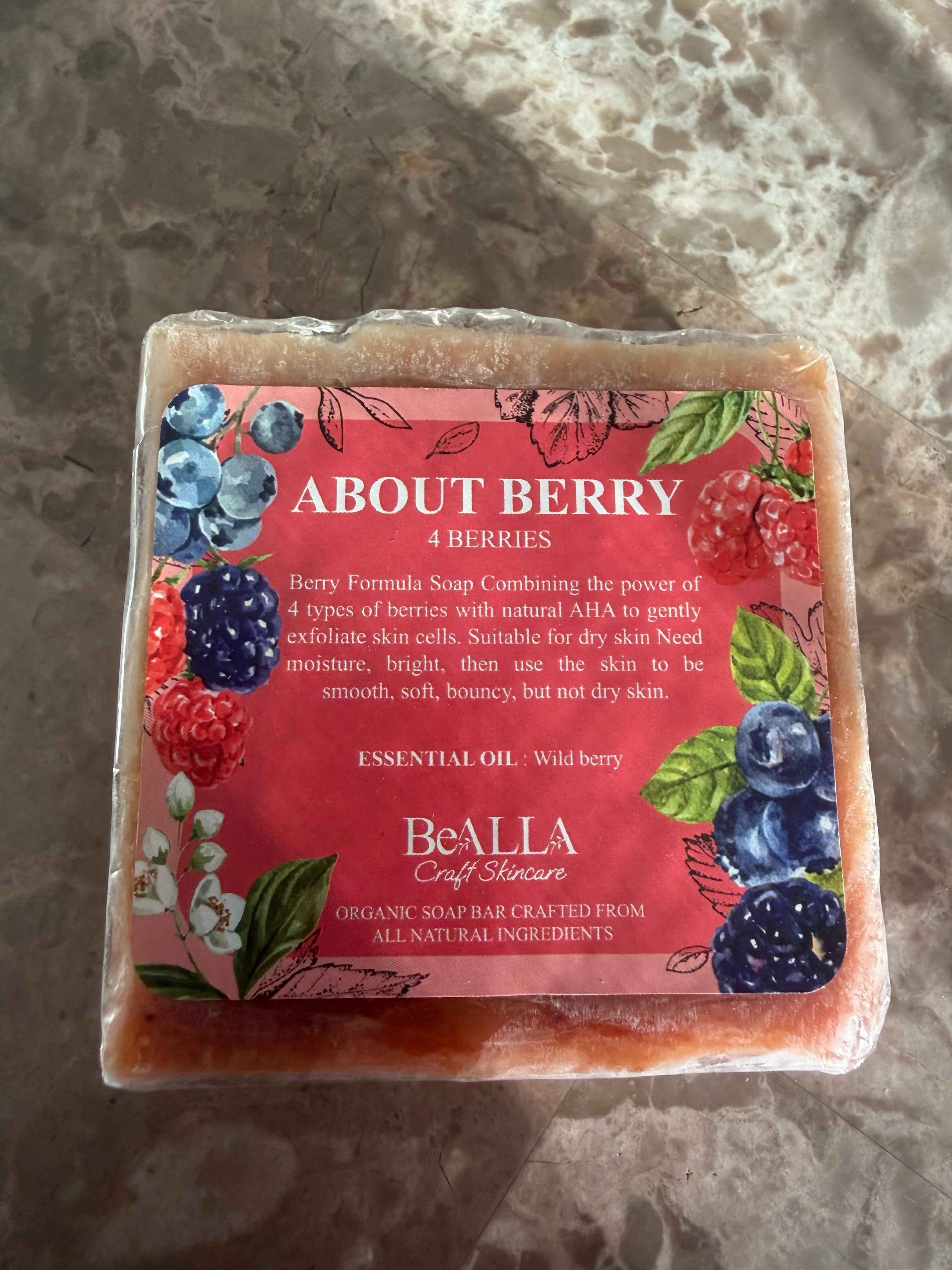 BeALLA soap bar with berry design on a textured surface