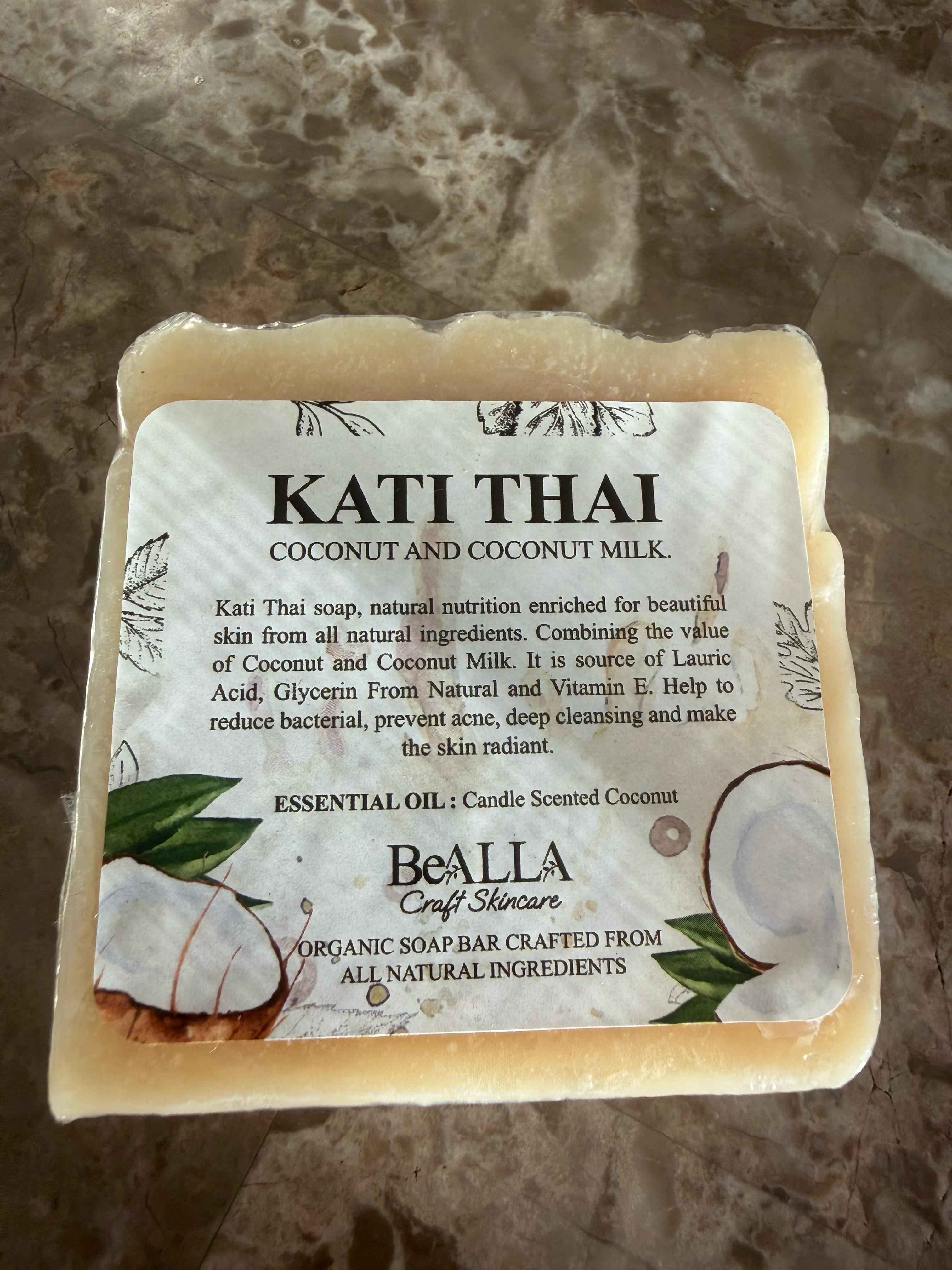 Kati Thai coconut and coconut milk soap bar with BeAlla branding on a marble surface